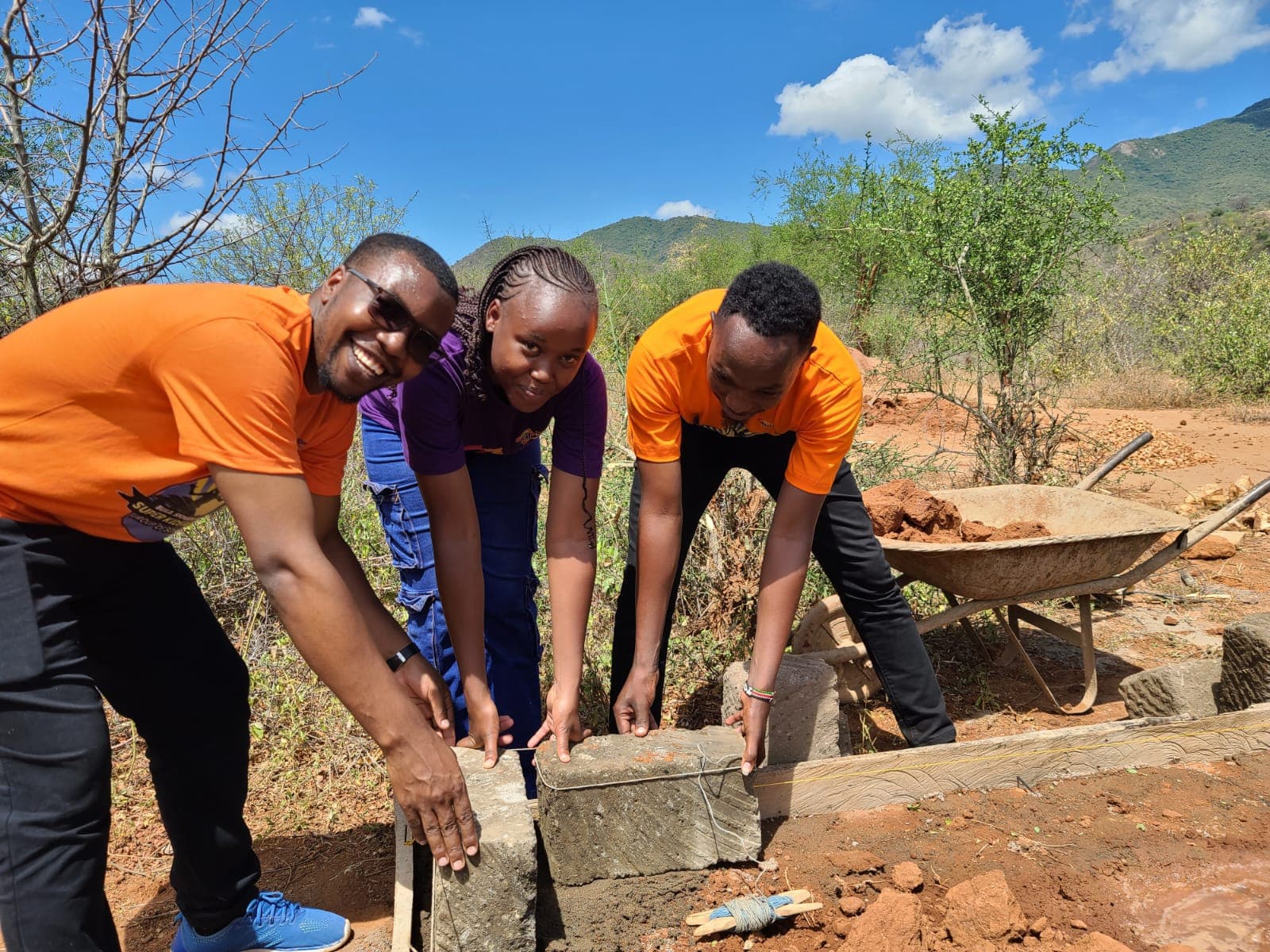 Super Kids Africa team building the Kakunguu School foundation